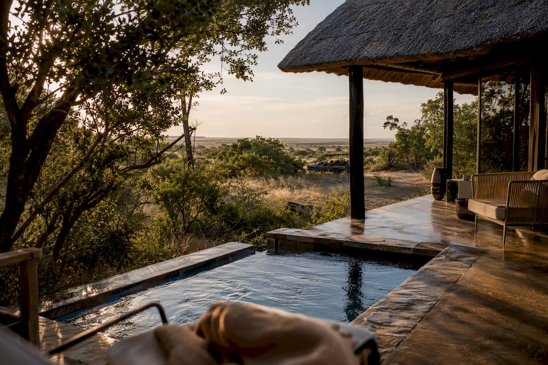 Thatched safari suite with plunge pool in mopane woodland