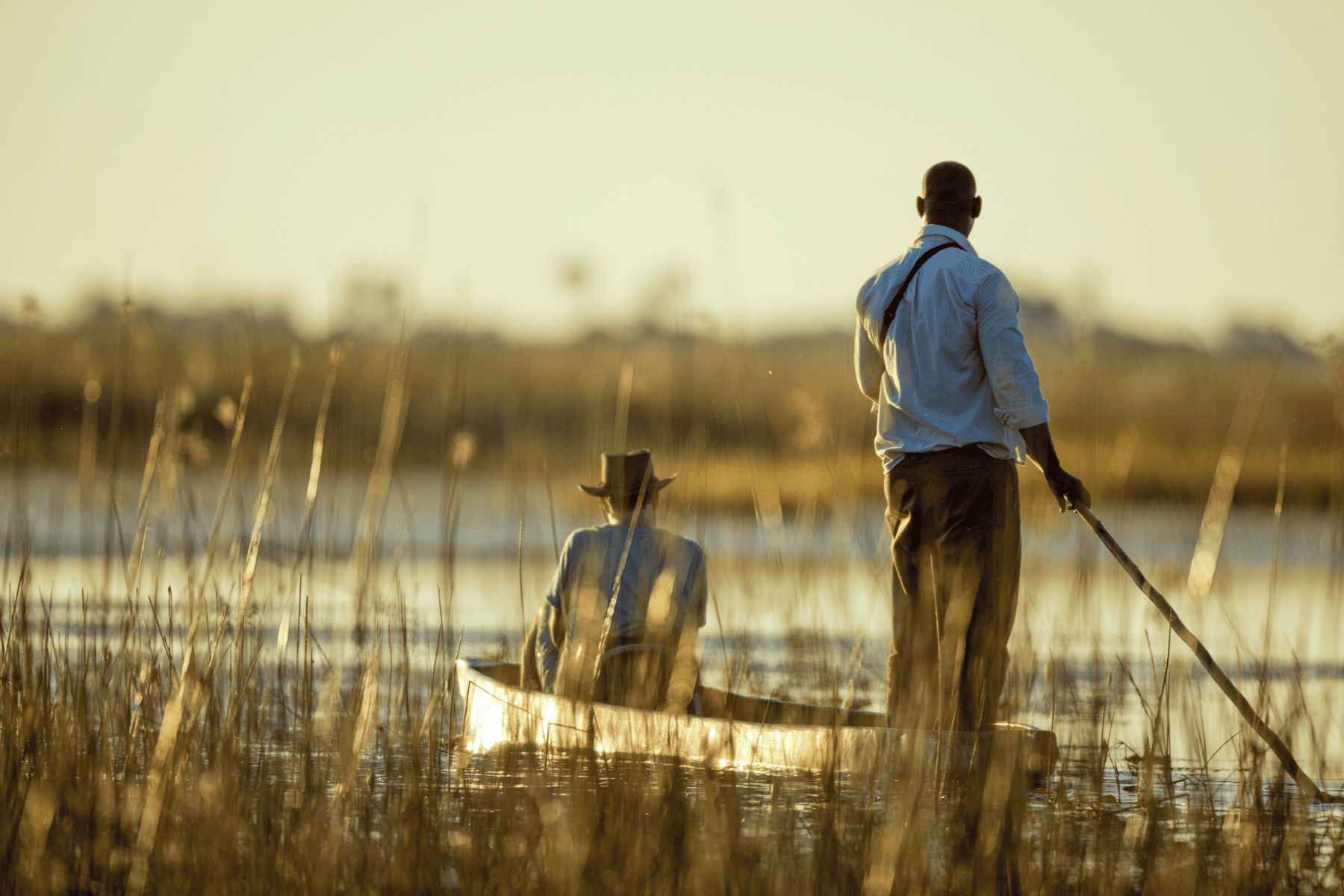 Two people in canoe on okavango