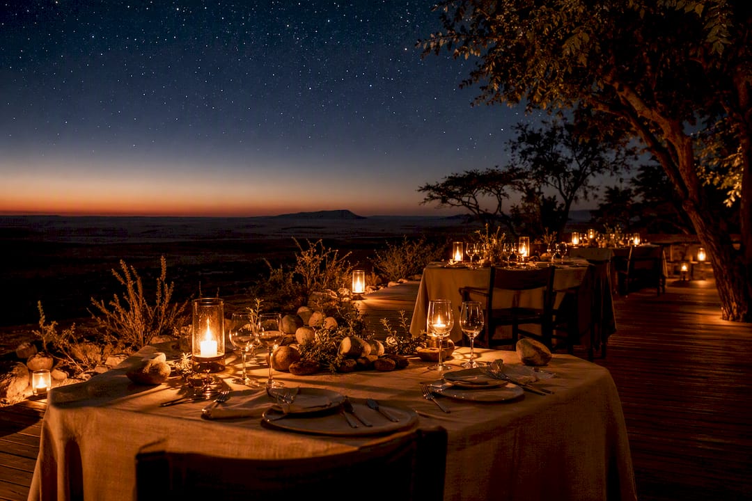 Candlelit bush dinner at luxury safari lodge