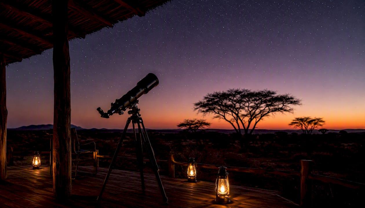 Private safari lodge deck stargazing at dusk in dark sky reserve